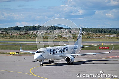 Finnair airplane waiting for departure in Helsinki Editorial Stock Photo
