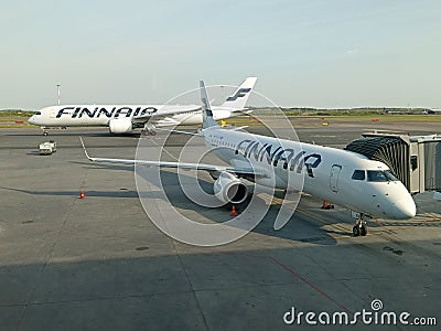 Finnair Embraer 190 and Airbus A350 Editorial Stock Photo