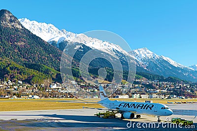 Finnair jet on the apron at Innsbruck Airport INN Editorial Stock Photo