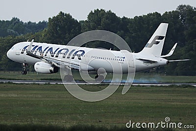 Finnair jet taking off from taxiway Editorial Stock Photo