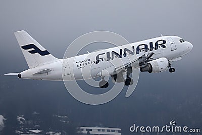 Finnair taking off from foggy runway Editorial Stock Photo