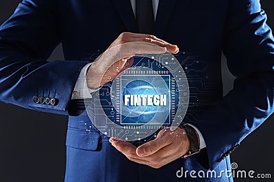 Fintech concept. Man demonstrating chip and schemes Stock Photo