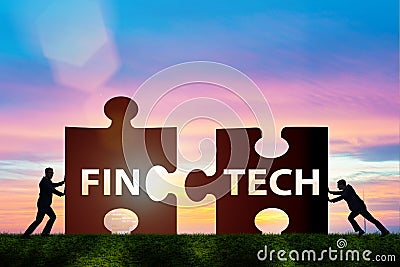 The fintech financial technology concept with puzzle pieces Stock Photo