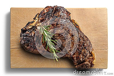 Fiorentina T-bone steak cut on rectangular wooden chopping board Stock Photo