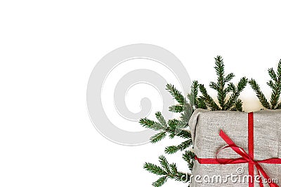 Fir branch / twig and burlap canvas christmas gift box on white Stock Photo