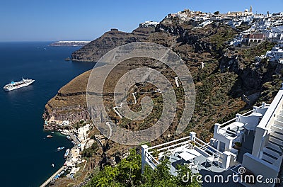 Fira panoramic view, Santorini island with donkey path and cable car from old port, high volcanic rocks in Greece Editorial Stock Photo