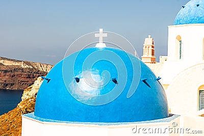 Fira town on Santorini island, Greece. Oia village in the morning light. Amazing romantic scenery with white houses. Island of Stock Photo