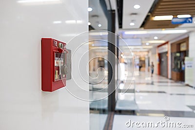 Fire alarm on the wall of shopping mall warning and security system Stock Photo