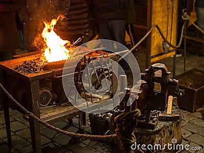 Fire and anvil, Christmas market in Prague Stock Photo