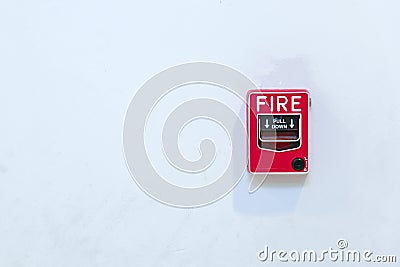 Fire alarm box on white wall for warning Stock Photo