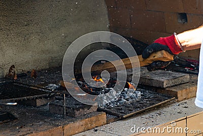 Fire in a barbaque, setting fire on coal barbacue Stock Photo