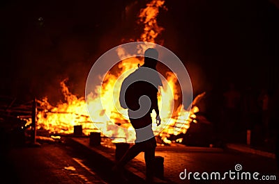 Fire and barricade Stock Photo