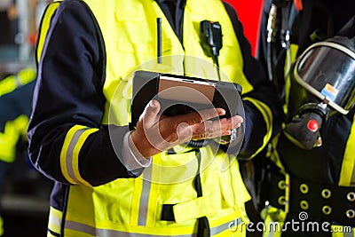 Fire brigade deployment plan on Tablet Computer Stock Photo