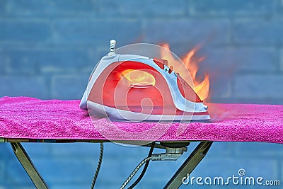 Fire caused by faulty home appliance destroyed property. Stock Photo