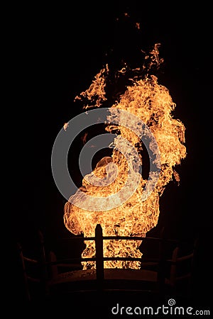 Fire coming from a large outdoor lantern Stock Photo