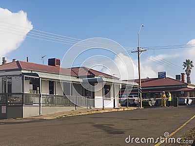 Fire damaged restaurant with emergency workers Editorial Stock Photo