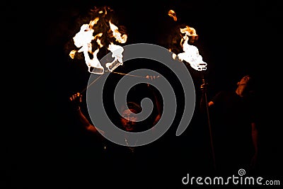 Fire dancing show in the night time at the beach Editorial Stock Photo