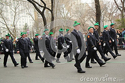 Fire Department of New York firefighters marching at the St. Patrick's Day Parade in New York. Editorial Stock Photo