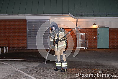 Fire department putting out arson Editorial Stock Photo