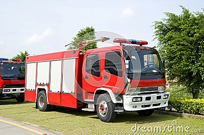 Fire engines in park Stock Photo