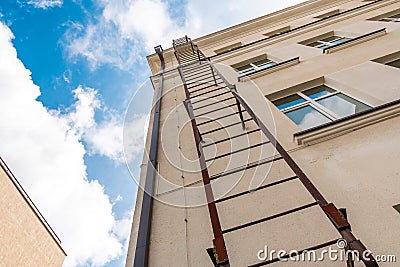 Fire escape leading to the roof of the house Stock Photo