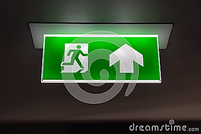 Fire exit ,green emergency exit sign Stock Photo