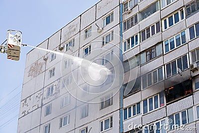 Fire extinguishing from fire tower with hydrant Stock Photo