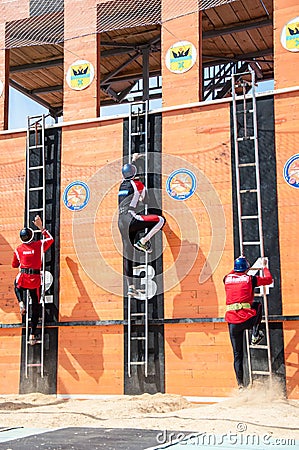 Fire fighter is competing Editorial Stock Photo