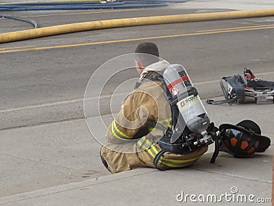 Fire fighter sitting this one out Editorial Stock Photo