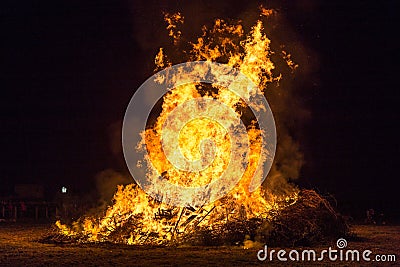 Fire flames with sparks and ember on black background Stock Photo