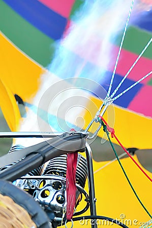 Fire heats the air inside a hot air balloon Stock Photo