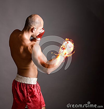 Fire hitting boxer Stock Photo