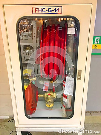 Fire hose cabinet Hydrant with water hoses in the mall Stock Photo