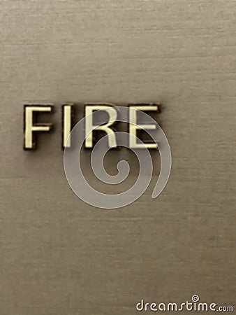 FIRE inscription on a wall background Stock Photo
