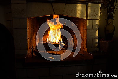 Fire isolated in black woods fireplace for background Stock Photo