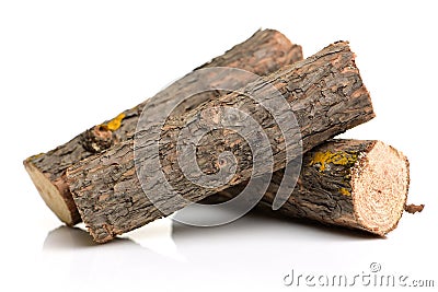 Fire logs whole round and cut wood lumber Stock Photo