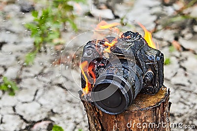 In a forest fire, a tourist camera burned down Stock Photo