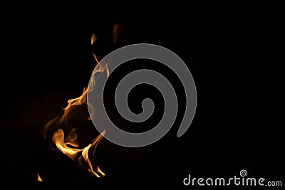 Fire shape in pitch black background Stock Photo