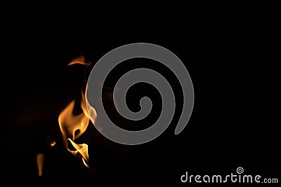 Fire shape in pitch black background Stock Photo