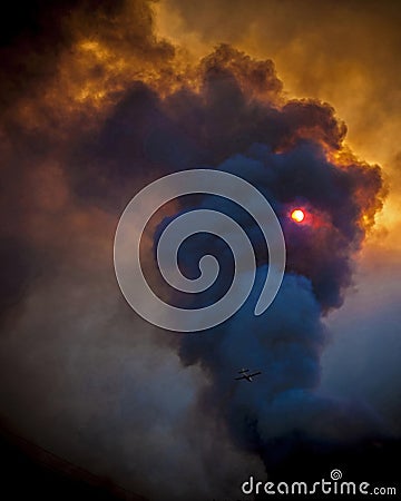Fire and smoke in sunset Stock Photo
