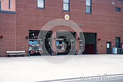 Fire station in a small town Berlin in Maryland USA. Three fire trucks are in the open garage Editorial Stock Photo