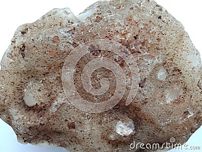 Fire stone close up with white textured background. natural stone, rare semiprecious. wallpaper, sea ,ocean. Stock Photo
