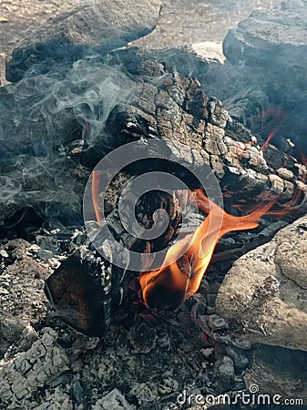 fire stone nature travel campfire fun smoke Stock Photo