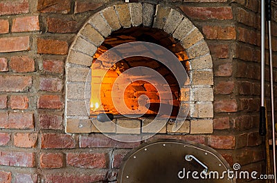 Fire in stone oven Stock Photo