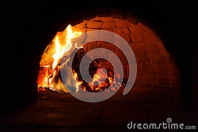 Fire in traditional oven for cooking Stock Photo