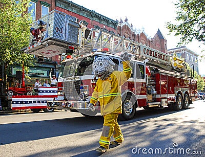 Fire Truck Dalmatian Mascot in Parade Editorial Stock Photo