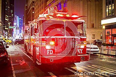 Fire truck with emergency lights on the street Stock Photo