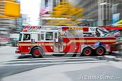 Fire trucks and firefighters brigade in the city Stock Photo