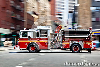 Fire trucks and firefighters brigade in the city Stock Photo