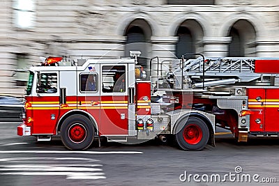 Fire trucks and firefighters brigade in the city Stock Photo